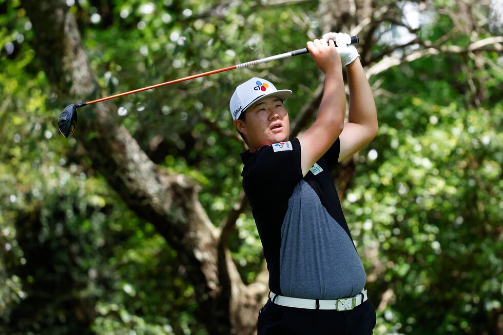 Sungjae Im of Korea plays a stroke from the No. 2 tee during the first round of the Masters at...