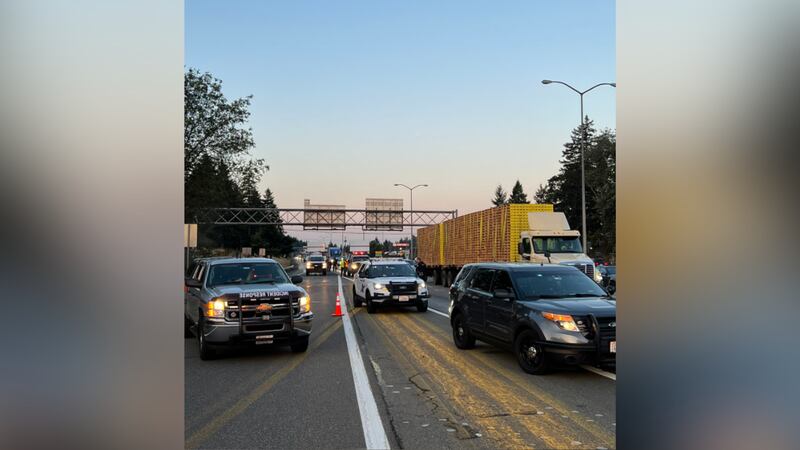 Two men in Washington state died after a loose tire went through the windshield of a passenger...