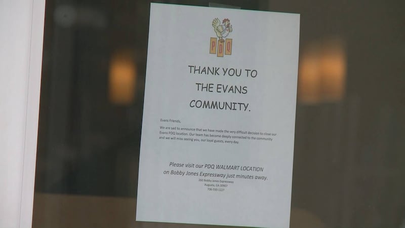 The sign on the PDQ in Evans says the location is closing. (Source: WRDW)