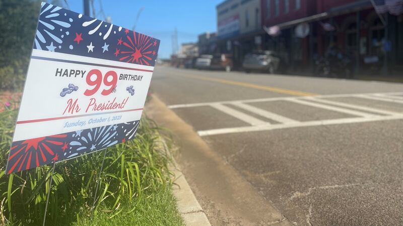 A sign wishing Jimmy Carter a happy 99th birthday in downtown Plains, GA.