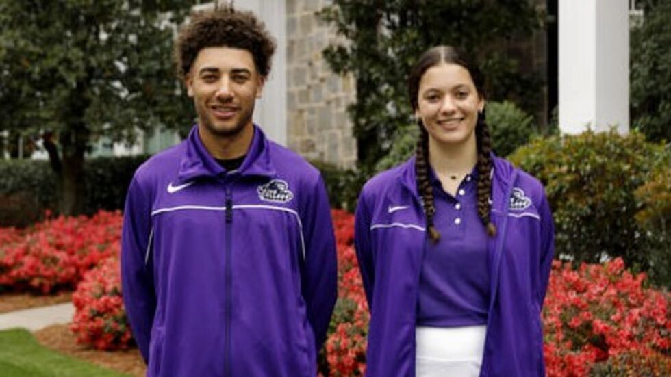 Payne College scholarship recipients Devin Smith and Taya Buxton after a news conference for...