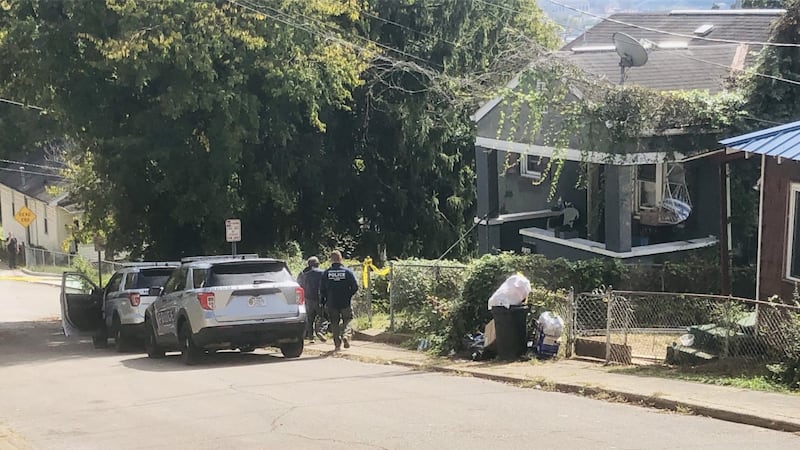 Police respond to a home on Adele Street in Charleston after a woman's body was found October 4.