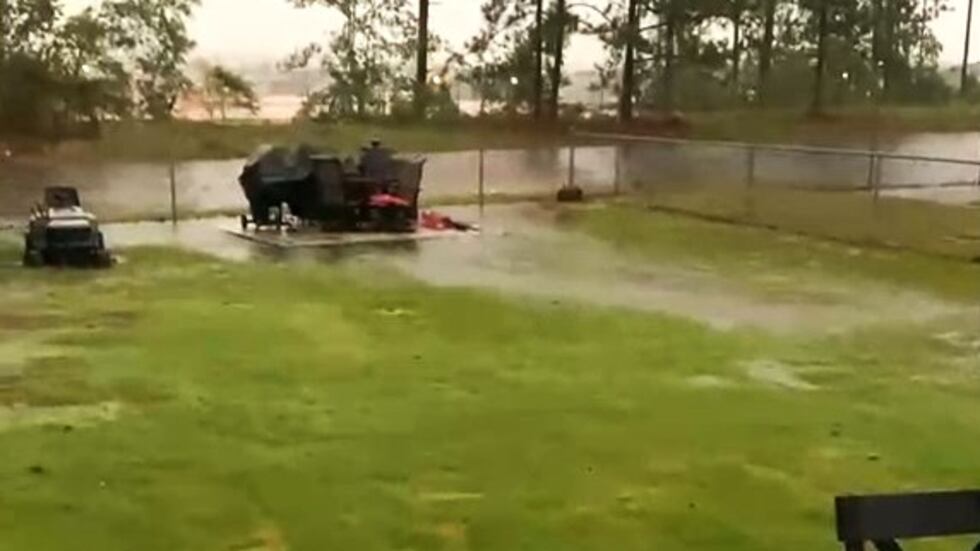 A retention pond overflowed near Spirit Creek, neighbors said.